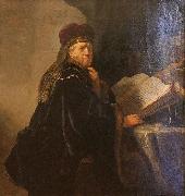 REMBRANDT Harmenszoon van Rijn A Scholar Seated at a Desk oil painting on canvas